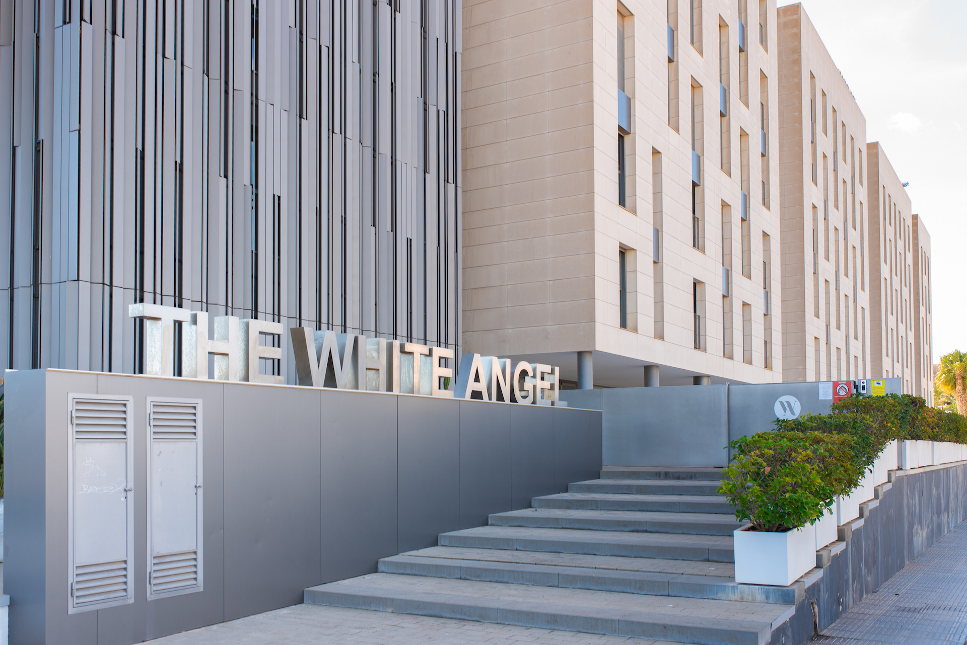 Resa Estates apartment for sale in Ibiza marina botafoch modern entrance.jpg